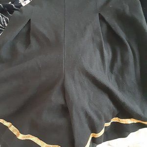 Girl's Black skirt with gold trim